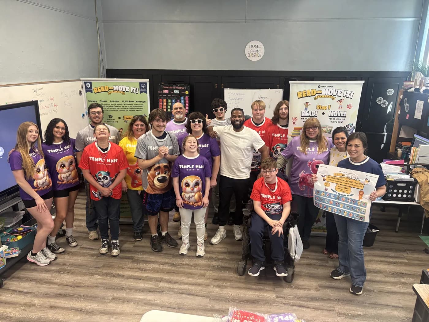 Cabool students and staff gathered in program shirts with their Read and Move It classroom tracker
