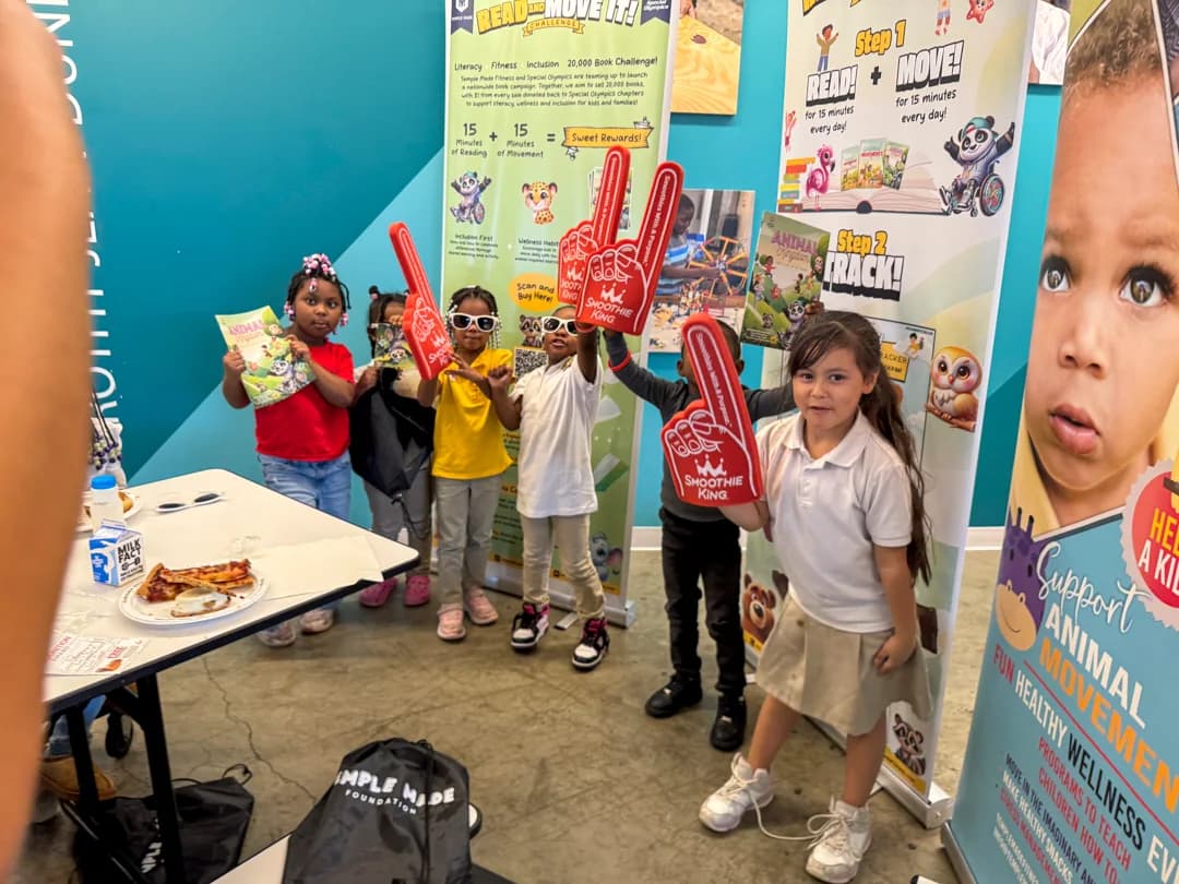 Children celebrating Read and Move It at Operation Breakthrough