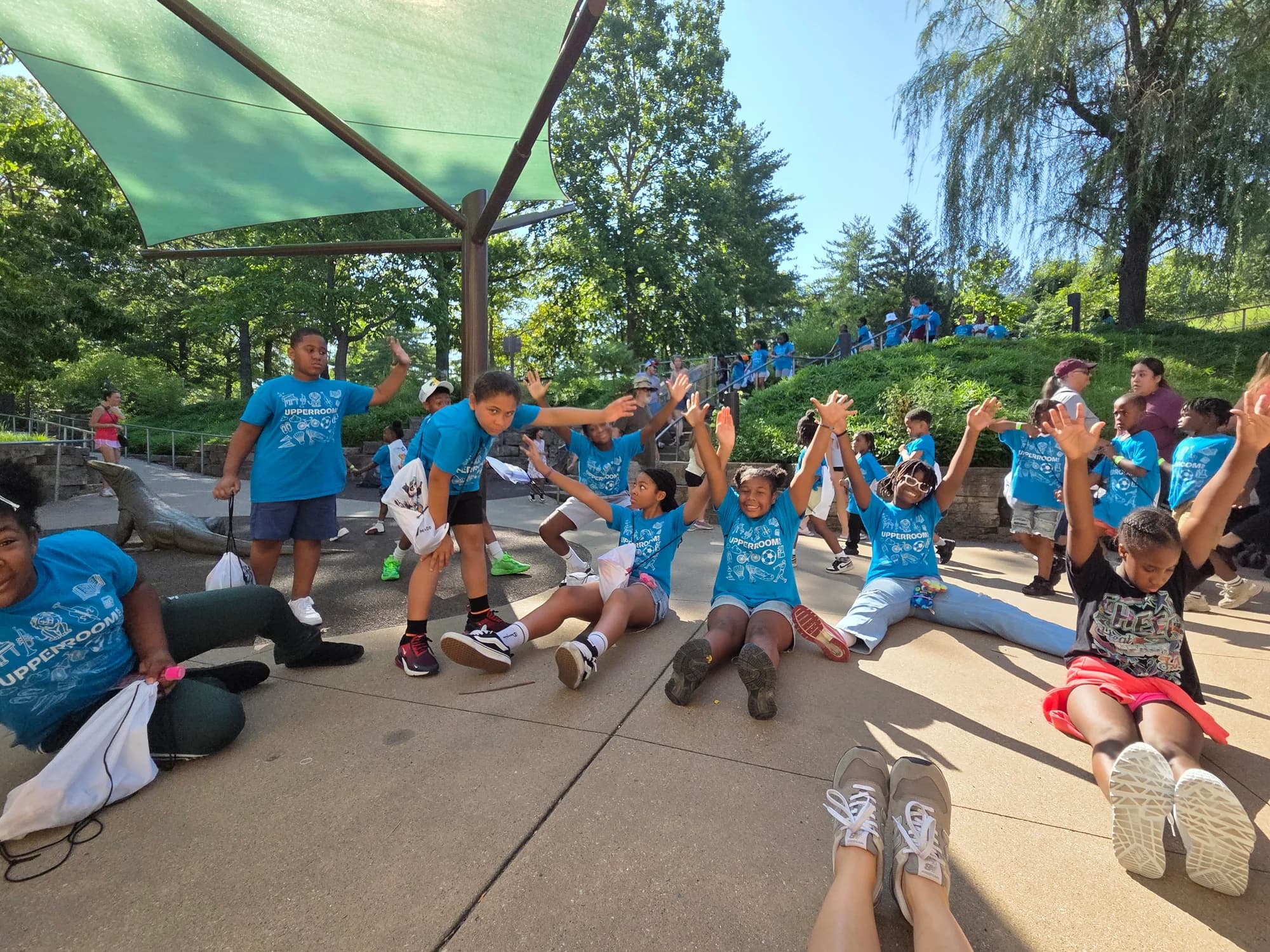 Children and Temple Made leaders moving together during KC Zoo Wellness Week
